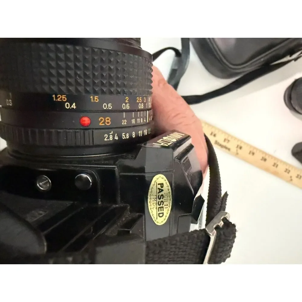 Minolta X-700 with accessories and carry case.